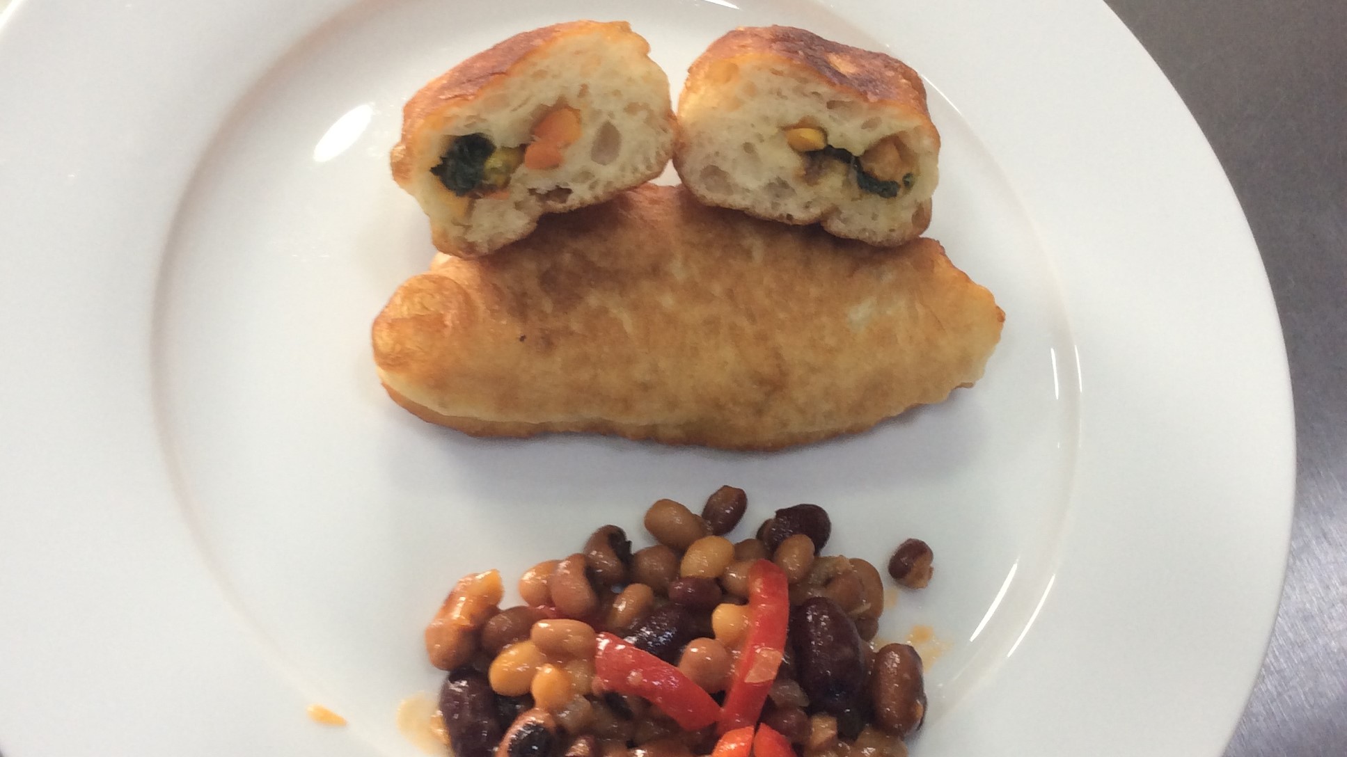 Vegetable pastry rolls and bean salad